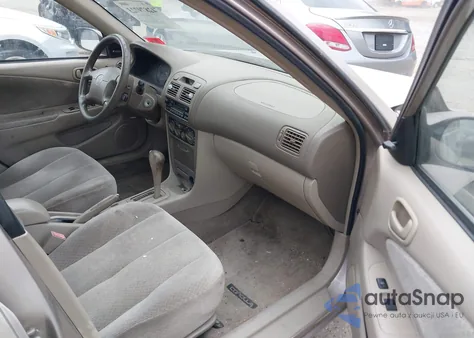 1999 Toyota Corolla Ce z USA, uszkodzony, nr VIN 2T1BR12E2XC142458